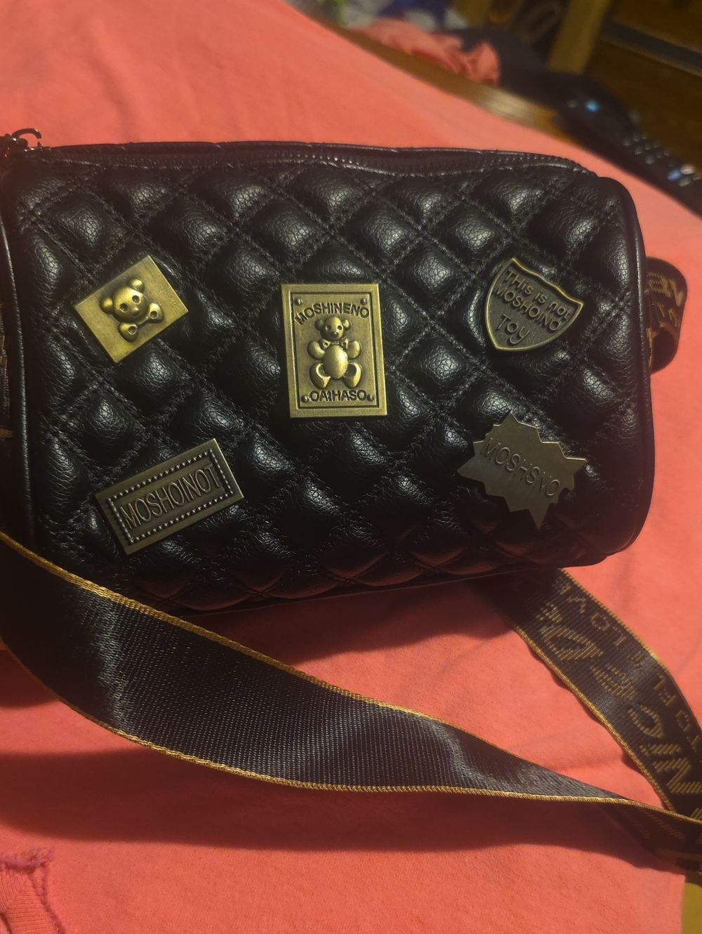 MOSHINENO Black Quilted Crossbody Bag with Gold Accents
